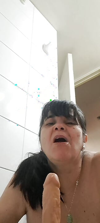 Milf receiving the liquid in her mouth