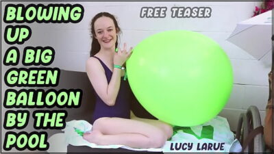 Blowing Up A Big Green Balloon by the Pool