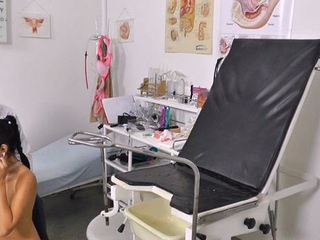 Lovely small titted brunette fingering her pussy